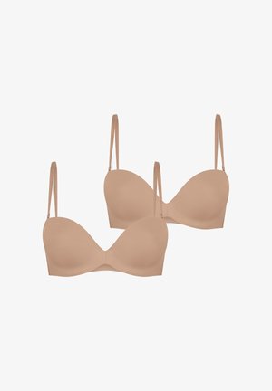 Deux soutiens-gorge rembourrés beiges avec bretelles fines réglables, présentés sur un fond blanc.
