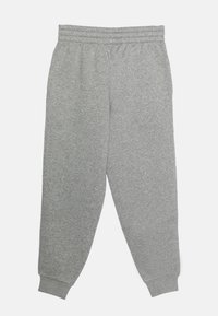 Grå sweatpants i mjukt tyg, med resårmidja och ribbade manschetter. Raka ben med inga synliga fickor eller mönster.