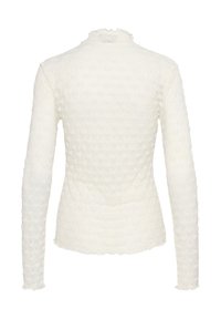 Pitkähihaisen paita off-white tekstuurikankaan kanssa, jossa on kuhmopinta ja rypytetty pyöreä kaulus, ja jossa on ommeltu viimeistely hihoissa.