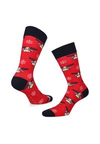 Czerwone skarpetki z granatowym mankietem, ozdobione wzorem z kreskówkowymi reniferami i białymi płatkami śniegu. Wykonane z miękkiego materiału, idealne na co dzień.