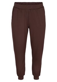 Braune Jogginghosen mit elastischem Bund und konischen Beinen, mit gerippten Bündchen, aus weichem Stoff, glatter Textur, ohne sichtbare Muster oder Akzentuierungen.