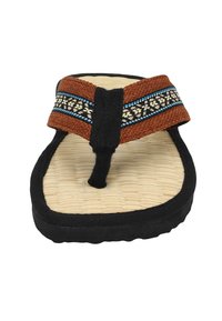 Brown woven sandal with black accents, textured footbed, and a decorative patterned strap featuring blue and white details.