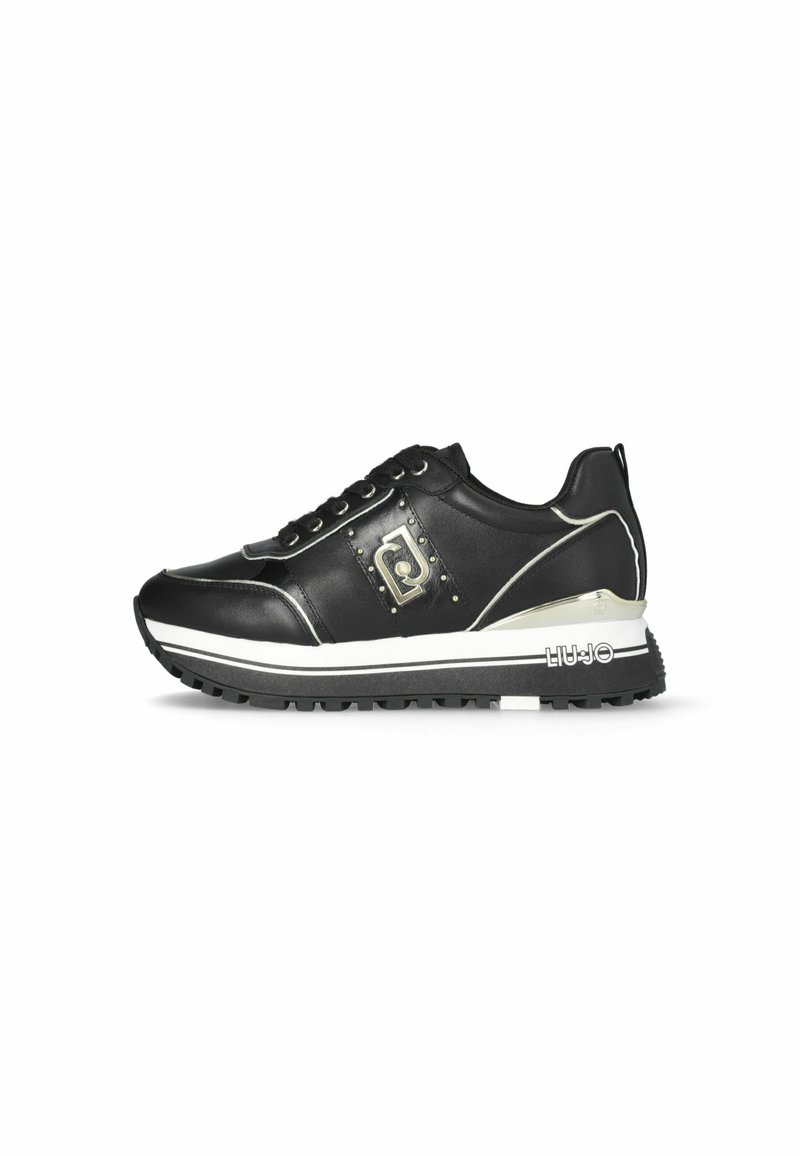Schwarze Ledersneaker mit weißen Akzenten, Metallnieten und Logodetail. Ausgestattet mit einer robusten Gummisohle und Schnürsenkeln. Schlankes, sportliches Design.