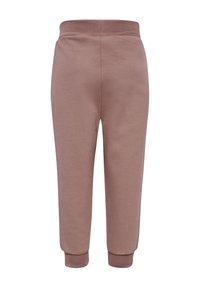 Bruine joggingbroek met een geribde tailleband en boorden. Zachte textuur, taps toelopend ontwerp en geen zichtbare patronen of hardware.