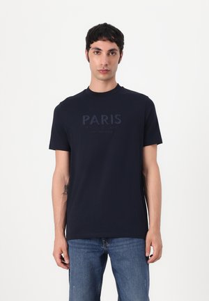 Mørkeblå bomull T-skjorte med preget "PARIS" logo på brystet, rund hals og korte ermer. Enkelt design med minimal detaljer.