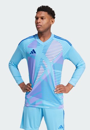 Lichtblauw langemouwen voetbalshirt met geometrische paarse patronen, diagonale strepen en een V-hals ontwerp. Adidas-logo op de borst.