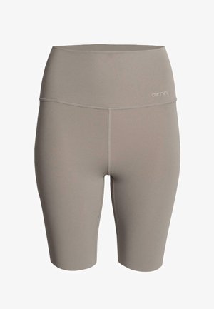 Vysokoúzke cyklistické šortky z mäkkej, taupe tkaniny. Majú hladký povrch so šitými detailmi a malým logom na pásku.