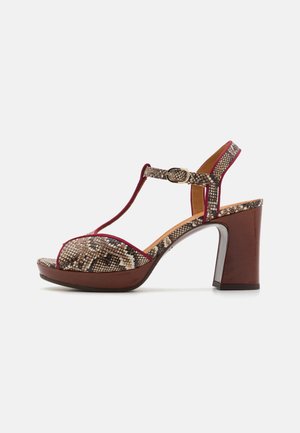 High heeled sandals - brown