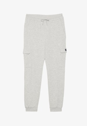 Grey sweatpants made of soft fabric. Features elastic waistband with drawstring, two side pockets, and ribbed cuffs at the ankle.