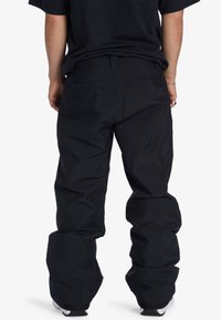 DC Shoes FUNKTIONELLE - Pantalones de snowboard - kvj0 black
