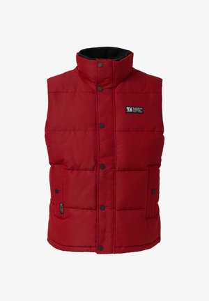 Punane puffer vest kõrge kraega, eesnupuvajutusega kinnitusega ja kahe esise taskuga. Vasakul rinnal on logopatch. Sile tekstuur.