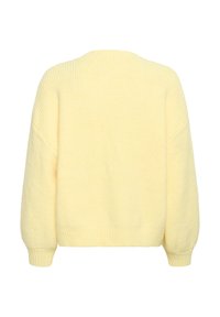 Pull en maille jaune avec tissu texturé, épaules tombantes, poignets et ourlet côtelés. Présente une silhouette décontractée et courte.