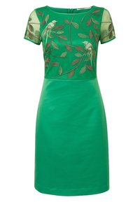 Zelené šaty s krátkým rukávem, na živůtku zdobené vyšitými ptáky a listy. Hladká dolní část, přiléhavý střih.