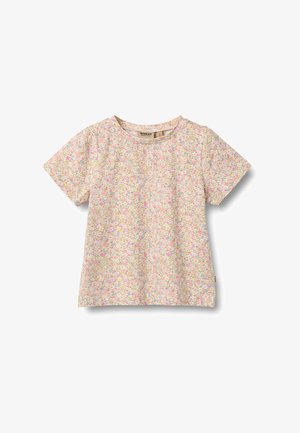 Lasten lyhythihainen t-paita, jossa on vaalean beigen taustalla pieniä kukkakuvioita vaaleanpunaisena, keltaisena ja vihreänä.