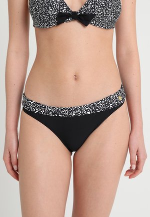 Svart bikini med ett mönstrat band vid midjan, prydd med vita abstrakta former. Overdelen har en rosett i mitten.