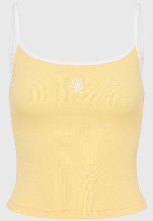 Débardeur jaune côtelé avec des bords blancs et des bretelles réglables, présentant un logo brodé discret au centre à l'avant. Texture de tissu douce.