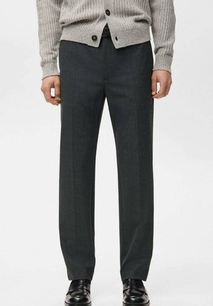 - Spodnie materiałowe