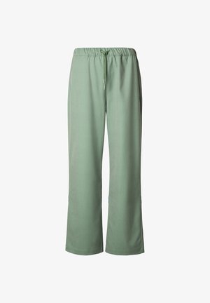 Pantaloni verde chiaro a vestibilità ampia con vita elastica e coulisse, gambe dritte e senza tasche visibili su sfondo bianco.