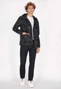 Schmuddelwedda urban rain czarny denim