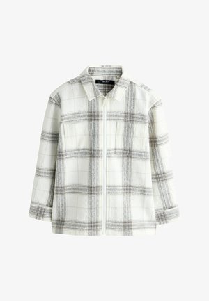 Weiße Jacke mit Reißverschluss, grauem Karomuster, langen Ärmeln und Kragen, flach auf weißem Hintergrund dargestellt.