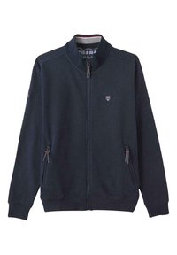 Veste zippée bleu marine en tissu doux, avec un col montant, deux poches avant zippées et un petit logo sur la poitrine.