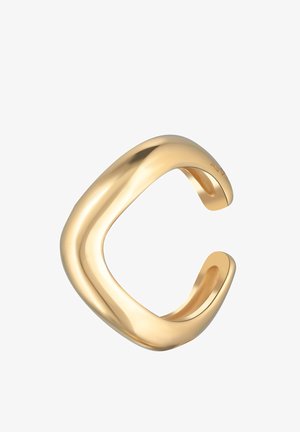 Guldtonet ring med et glat, bølget design. Den har åbne ender og en blank finish, som fremhæver en moderne, minimalistisk æstetik.