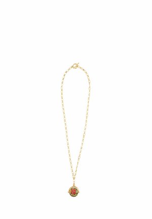 Gold chain necklace featuring a circular pendant with a red floral design, enclosed in a gold frame. Smooth texture and bright colors.