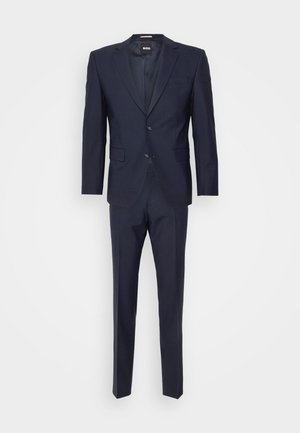 Marineblauer Anzug, einreihige Jacke mit Reverskragen, zwei Knöpfen und passender, schlanker Hose aus glattem Stoff.
