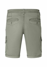 Cargo shorts in olive green, made of woven fabric. Features two back zip pockets and side cargo pockets. Rolled cuffs. Textured finish.