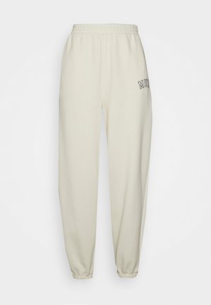 OVERSIZED BOY GRAPHIC - Tracksuit bottoms - antique cream