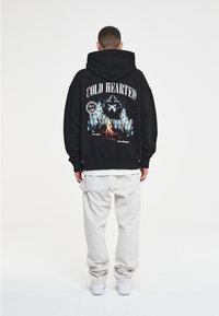 Pegador Luvtröja - black