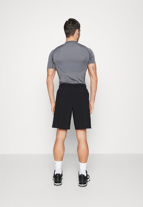 Nike Pantalón corto de hombre M Nk DF Unlimited Wvn 9In Ul Negro — photo 3