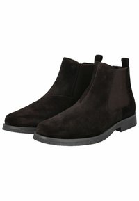 Stivaletti neri in suede con pannelli elastici laterali, punta rotonda e suola piatta in gomma. Presentano linguette per un indossamento facile.