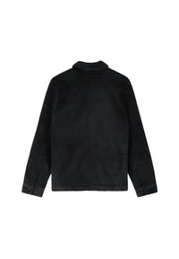 Zwarte corduroyjack met een kraag, lange mouwen, knoopmanchetten en een rechte snit. Opvallende textuur en kleuruniformiteit door het geheel.