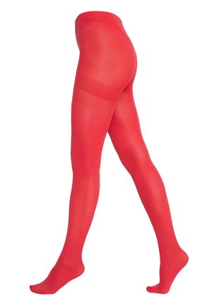 Beine mit leuchtend roten blickdichten Strumpfhosen in einer Gehpose vor weißem Hintergrund.