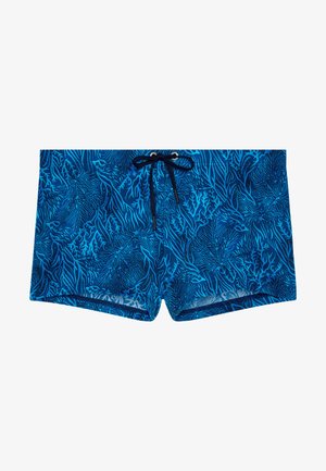 Short de bain bleu avec des motifs de récif corallien bleu foncé et un cordon noir à la taille.