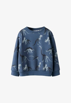 Sweat-shirt bleu pour enfants avec divers motifs de squelettes de dinosaures en blanc et noir, doté de manches longues et de poignets et ourlet côtelés.