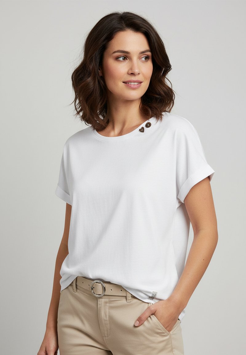 White short-sleeve top with a round neckline, featuring three decorative brown buttons on the left shoulder and a relaxed fit.