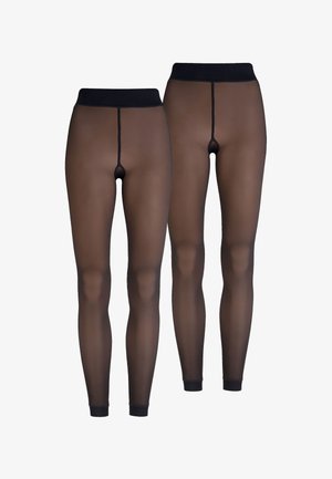 Przezroczyste czarne legginsy z wysokim pasem, z tylnym szwem i czarnymi mankietami przy kostkach. Gładka faktura i przezroczysty design.