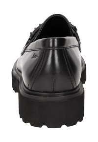 Zwarte leren schoenen met een dikke, gestructureerde zool, voorzien van decoratieve studs en een slank ontwerp. Zichtbare stiksels langs de randen.