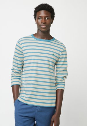 Langärmliges gestreiftes Hemd in Beige und Teal, mit rundem Halsausschnitt und kleinem Baum-Logo. Weicher Stoff mit lässiger Passform.