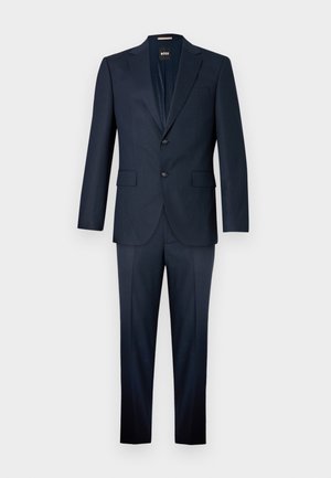 Navy suit set featuring a single-breasted blazer with two buttons, notch lapels, and matching flat-front trousers. Smooth texture, tailored fit.