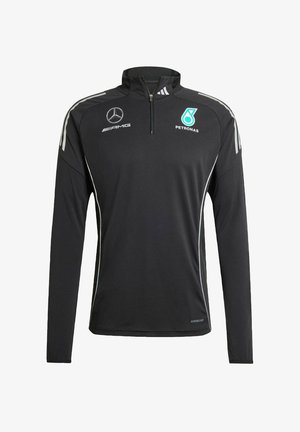 Czarna, długorzędowa koszulka sportowa z ćwierć zamkiem, z białymi i turkusowymi akcentami, wysokim kołnierzem oraz logo Mercedes i Petronas.