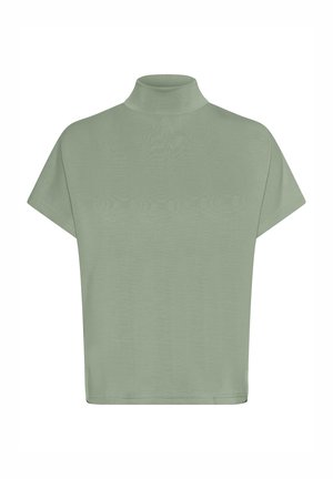 Short-sleeve mock neck top in light green, made of soft fabric. Features a relaxed fit and subtle texture, with a straight hem.