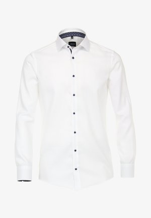Chemise blanche à manches longues avec un col évasé, boutons foncés et doublure intérieure à motif marine. Texture lisse, ourlet droit.