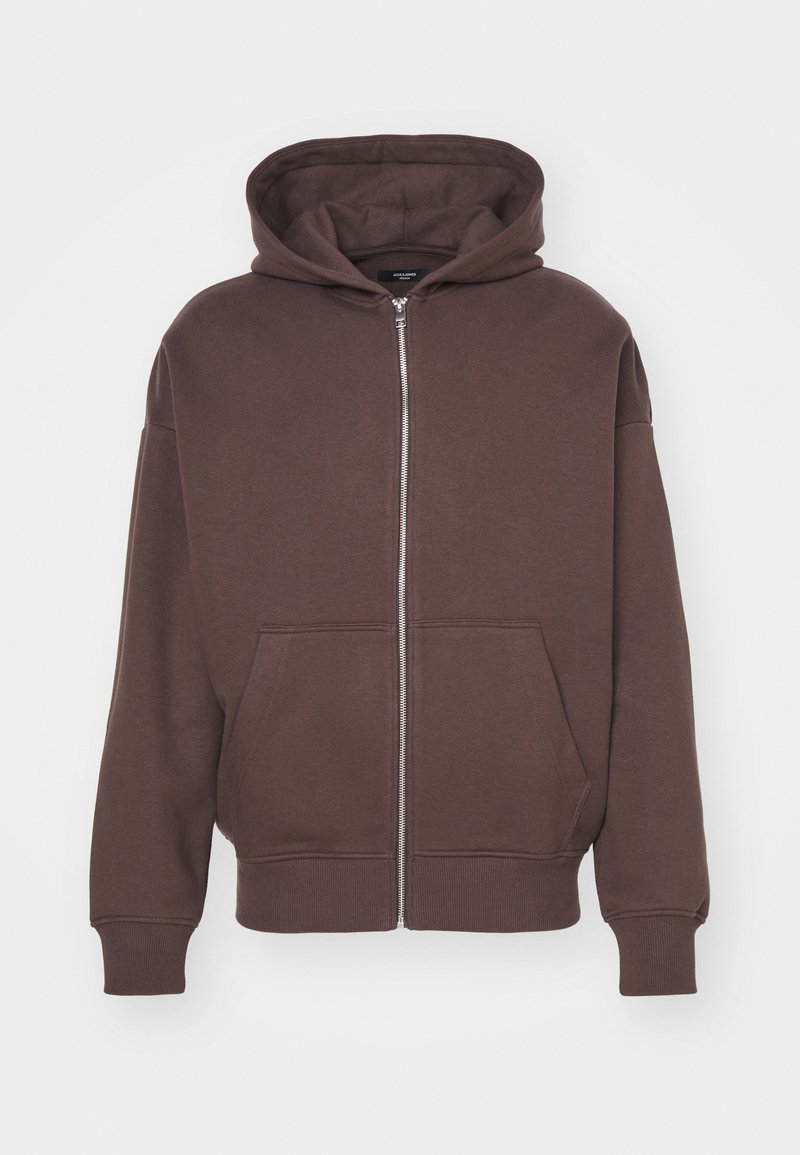 Brązowa bluza z kapturem na suwak, z kapturem ze sznurkiem, przednimi kieszeniami i ściągaczami przy mankietach. Wykonana z miękkiego materiału typu dżersej o fakturowanej powierzchni.