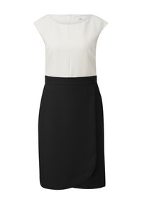 Robe sans manches avec un haut blanc et une jupe noire. La jupe noire présente un design enroulé, créant une texture lisse et des lignes épurées.