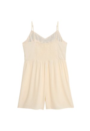 Krémový romper s tenkými ramínky, smockovaným korzetem a volnými šortkami. Měkká, lehká látka s hladkým povrchem.