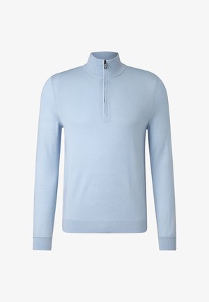 Jasnoniebieska bluza z długim rękawem, z wysokim kołnierzem na zamek, wykonana z gładkiej tkaniny. Posiada ściągacze na mankietach i dole, minimalistyczny design.