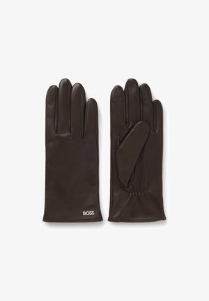 Brown leather gloves with five fingers, smooth texture, gathered wrist detail, and a small silver logo on the wrist.